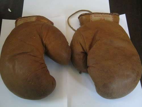 A RARE pair of Leather Gene Tunney Boxing Gloves made by A G Spalding & Bros circa 1920/30