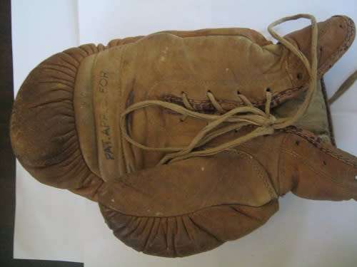 A RARE pair of Leather Gene Tunney Boxing Gloves made by A G Spalding & Bros circa 1920/30