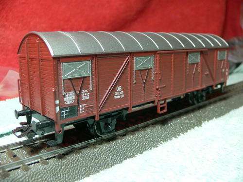 HO scale Marklin long covered goods wagon. Tagged and bagged.