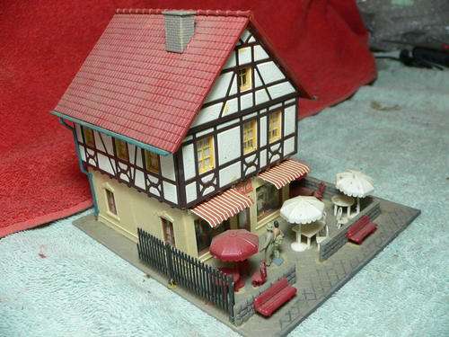 HO scale cute populated little coffee shop. Very nice