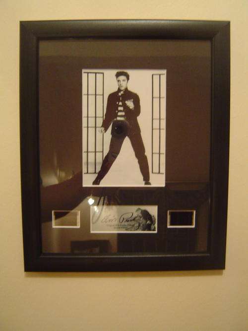 ELVIS PRESLEY FILM CELLS - Framed Elvis Picture with original Film Cells - authenticity certificate
