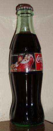 Coca Cola Santa - Christmas 1997 Bottle- USA Collectors item- FULL
