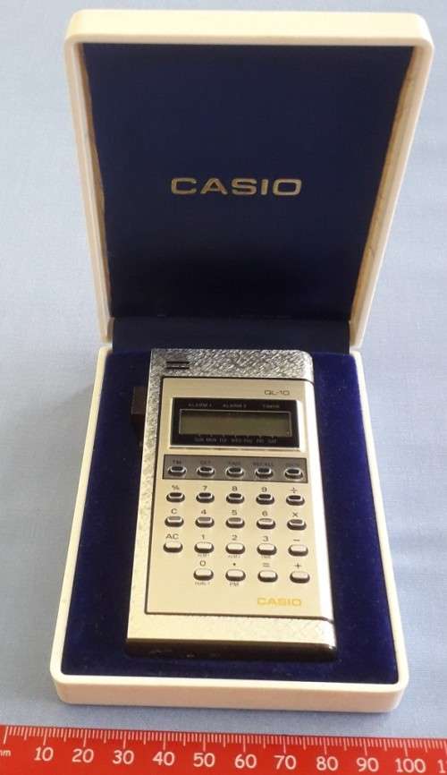 Scarce Vintage CASIO QL10 lighter/calculator/alarm/etc - like new/never used - needs batteries & gas