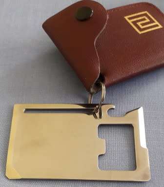 SURVIVAL KEY HOLDER - like new - unused - see 8 functions listed below