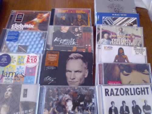 LOT OF 12 MUSIC CD`S  - BID FOR ALL-  ARTISTS: FROM QUEEN, THE BEATLES, CREEDENCE CLEARWATER, ETC.