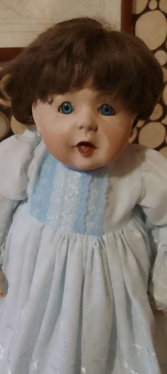 PORCELAIN DOLL - Christening Doll- 55 cm long - ON WOODEN STAND