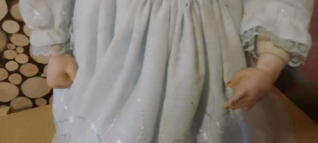 PORCELAIN DOLL - Christening Doll- 55 cm long - ON WOODEN STAND