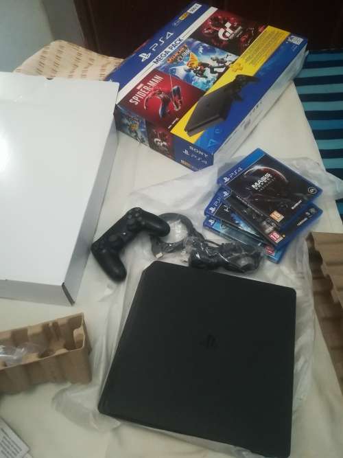 PS4 Slim (still new)
