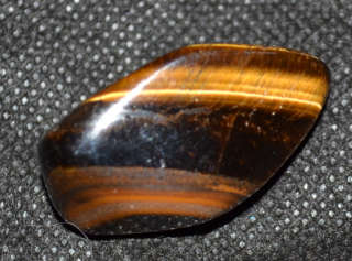 Large  Tigers Eye represents the power, courage, and fearlessness of the tiger