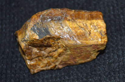 Tigers Eye  Rough  prosperity, abundance, and growth.