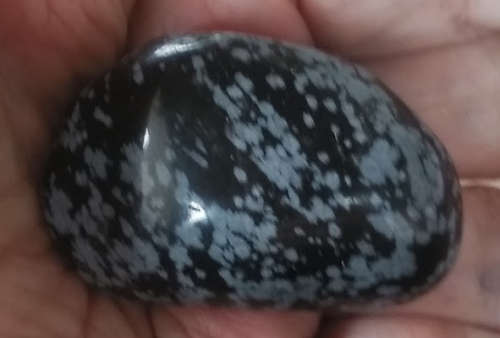 Palmstone Snowflake Obsidian is said to purify and ground body, soul, protective