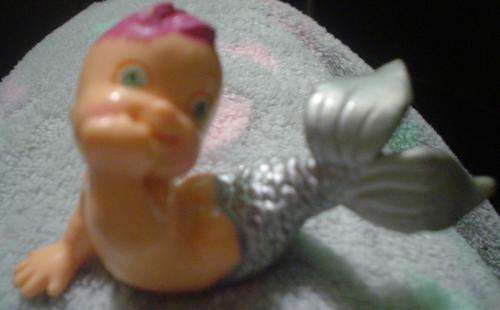 baby mermaid with pink hair