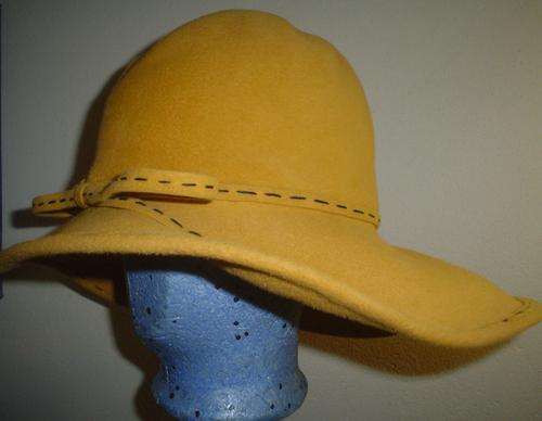 Mustard hat with black stritching