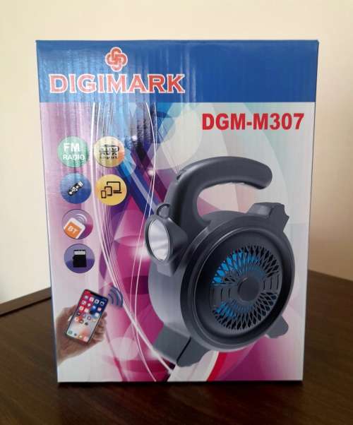 Bluetooth speaker with shoulder strap and Torche