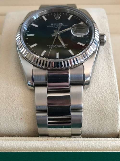 Rolex Oyster Perpetual Date Mens Watch 115234 34mm with 18ct white gold bezel [Box and Papers]