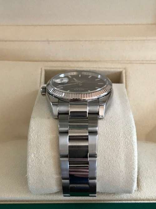 Rolex Oyster Perpetual Date Mens Watch 115234 34mm with 18ct white gold bezel [Box and Papers]