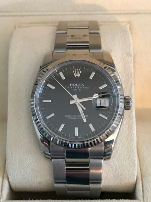 Rolex Oyster Perpetual Date Mens Watch 115234 34mm with 18ct white gold bezel [Box and Papers]