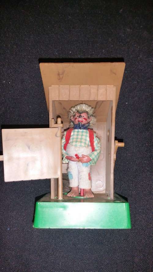 Vintage 1950's Peter Mecki in toilet house