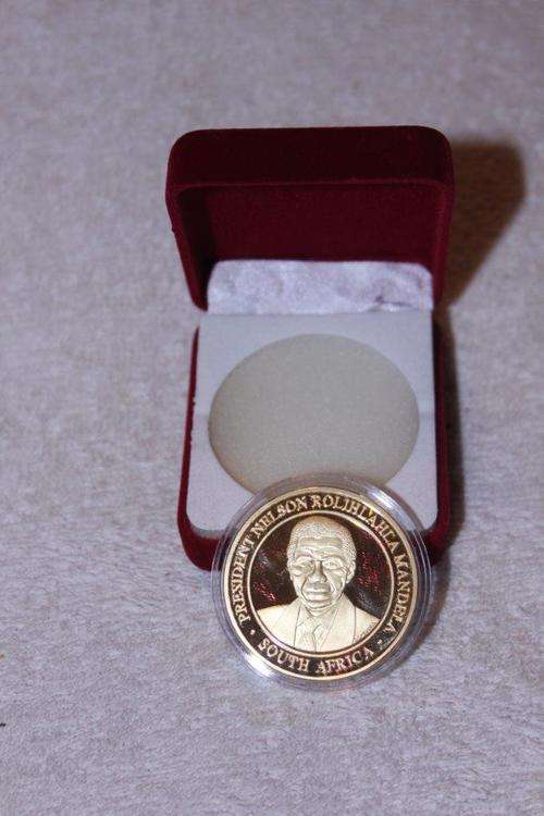 Mandela gold clad coin in burgandy display box Get yours now!!!