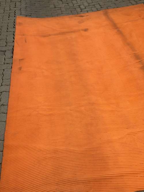 Large oriental rug including under-carpet