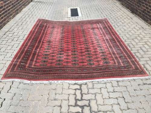Large oriental rug including under-carpet