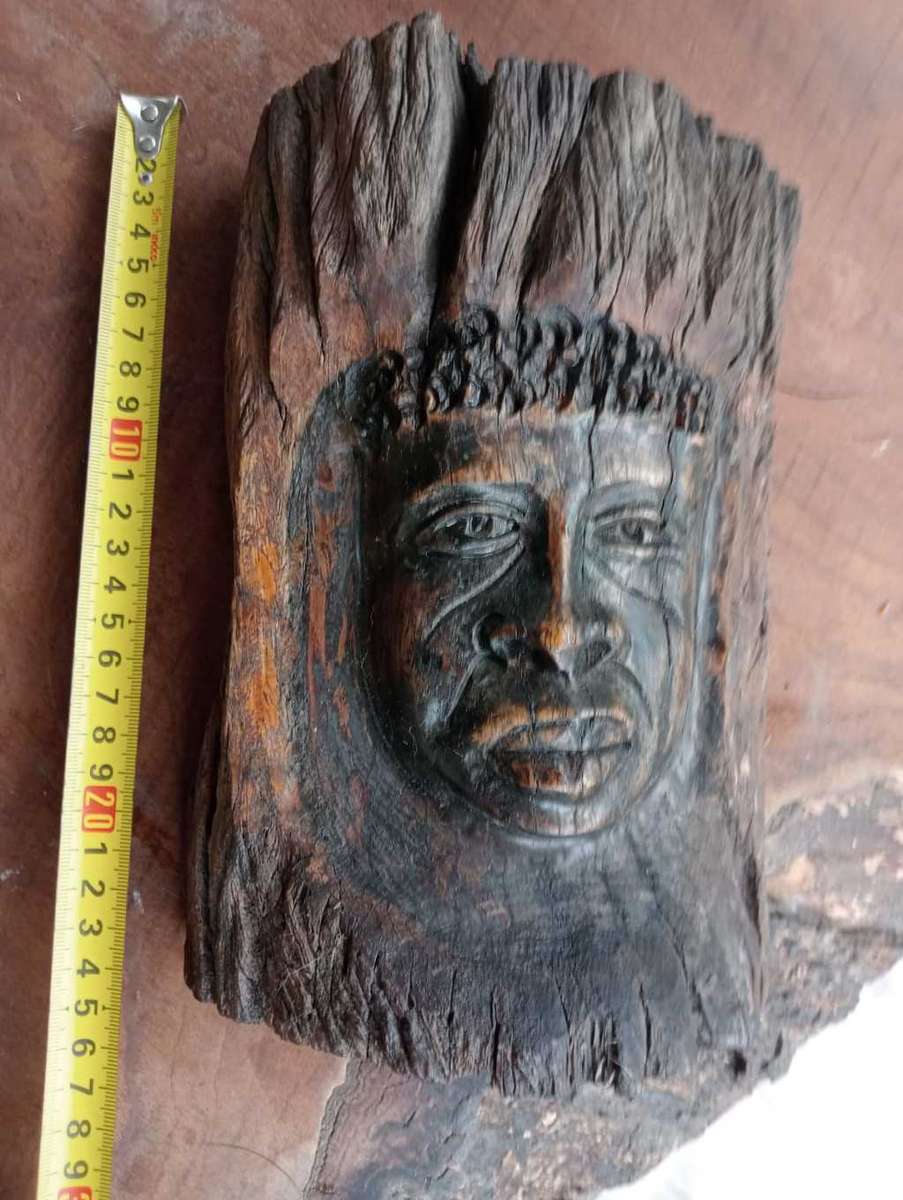 Carved face