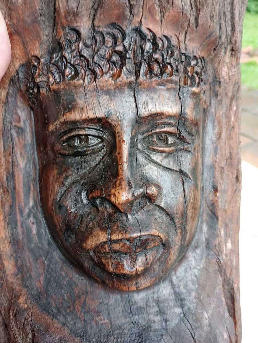 Carved face
