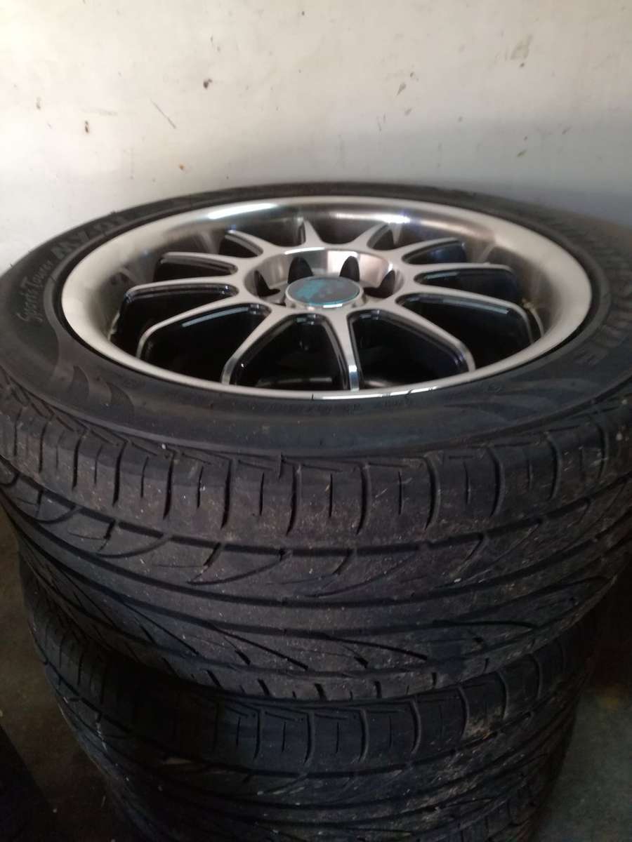 15" Mags with Bridgestone Tyres 195/50R15 (1 full set of 4 Mags &  Wheels)