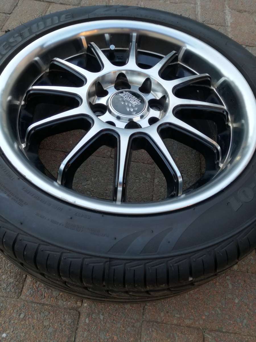 15" Mags with Bridgestone Tyres 195/50R15 (1 full set of 4 Mags &  Wheels)
