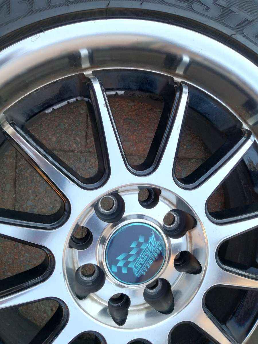 15" Mags with Bridgestone Tyres 195/50R15 (1 full set of 4 Mags &  Wheels)
