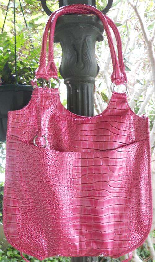 Stunning bright pink faux leather snakeskin print handbag