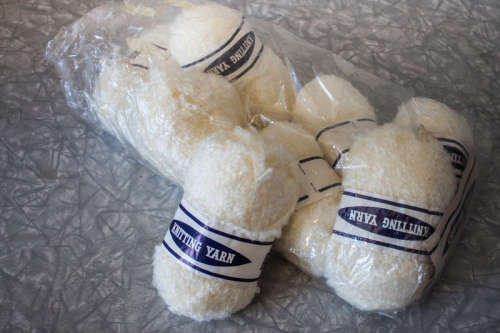 50g ball of Knitting yarn cream