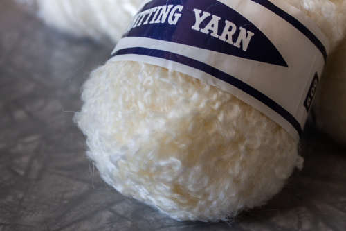 50g ball of Knitting yarn cream