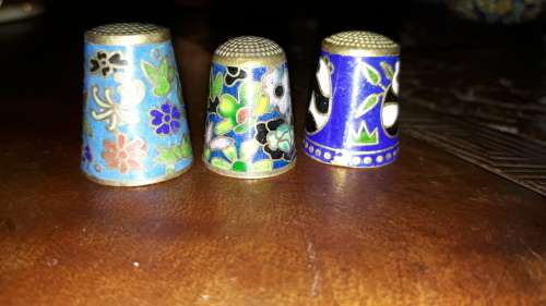 Trio of chinese needlework fingertip protectors
