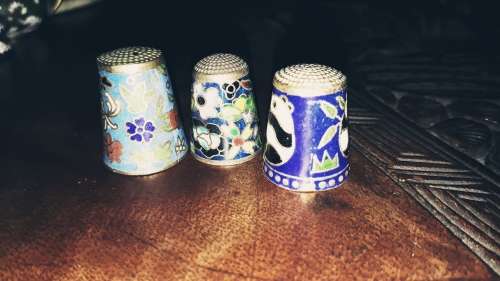 Trio of chinese needlework fingertip protectors