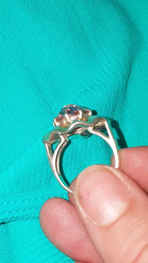 Stunning Sterling Silver Ring with Pink stone and gold accents