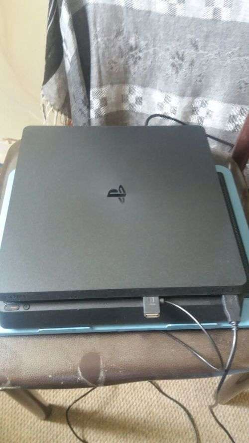 PS4 1TB  SLIM CONSOLE + 1 CONTROLLER  + 2 GAMES + COOLING FAN (AS NEW)(EXCELLENT CONDITION)