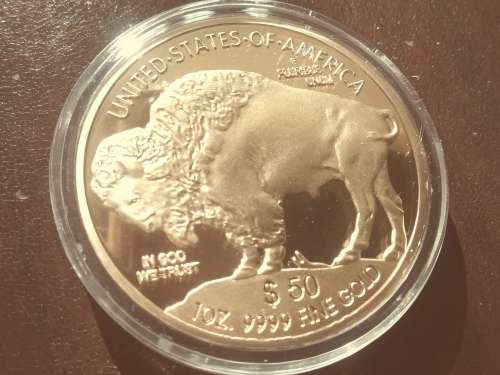 1 oz. 999 FINE GOLD CLAD - 50 $ - THE BUFFALO - ENCAPSULATED.