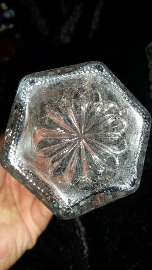 a pair of crystal or glass bottles