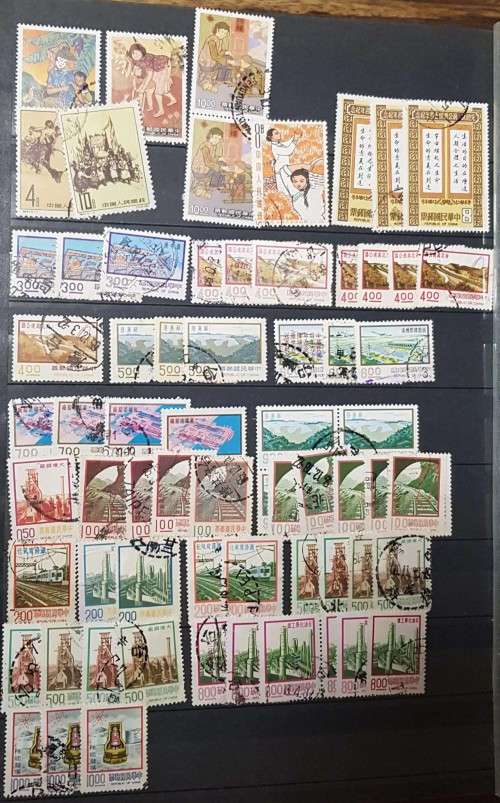 32 pages POSTAGE ALBUM WITH CHINA JAPAN ..MANY OVERPRINTS./MINT /USED/PAIRS ETC ETC .....HUGE VALUE