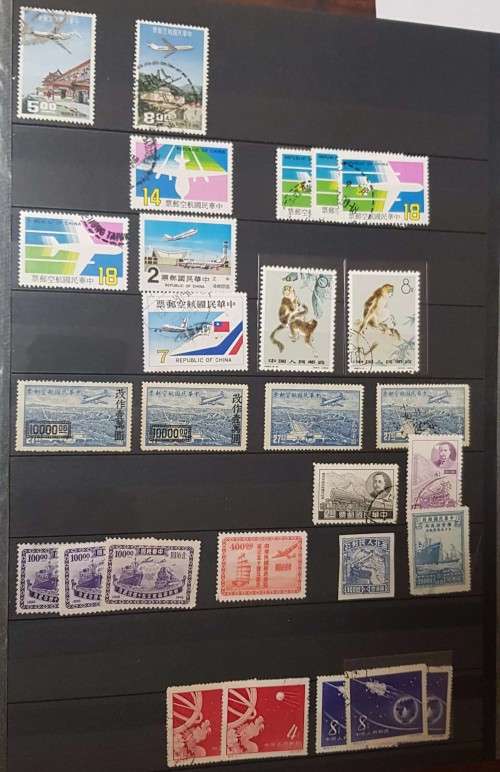 32 pages POSTAGE ALBUM WITH CHINA JAPAN ..MANY OVERPRINTS./MINT /USED/PAIRS ETC ETC .....HUGE VALUE