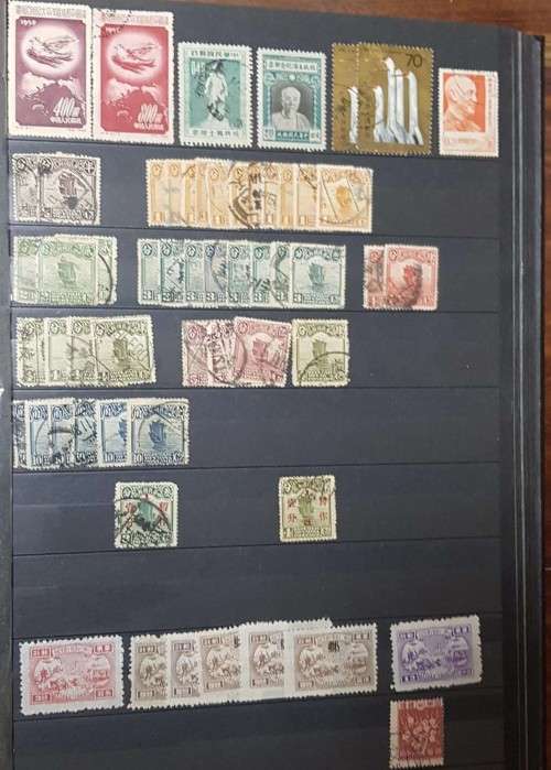 32 pages POSTAGE ALBUM WITH CHINA JAPAN ..MANY OVERPRINTS./MINT /USED/PAIRS ETC ETC .....HUGE VALUE
