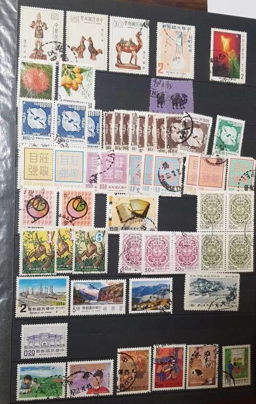 32 pages POSTAGE ALBUM WITH CHINA JAPAN ..MANY OVERPRINTS./MINT /USED/PAIRS ETC ETC .....HUGE VALUE