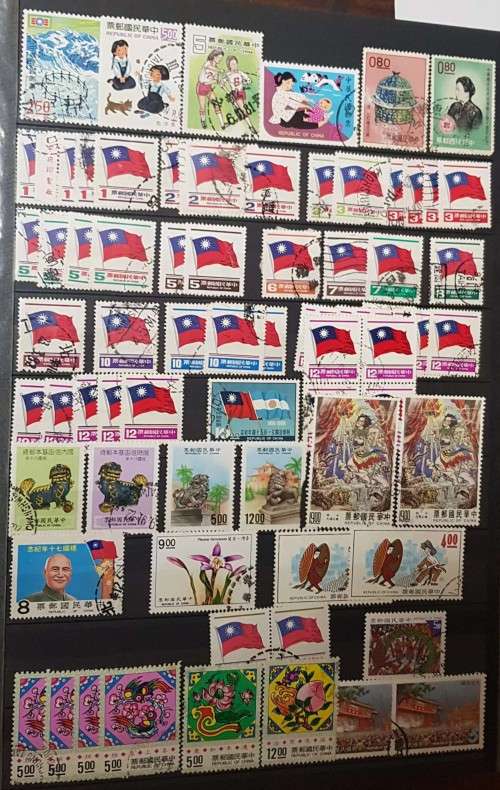 32 pages POSTAGE ALBUM WITH CHINA JAPAN ..MANY OVERPRINTS./MINT /USED/PAIRS ETC ETC .....HUGE VALUE