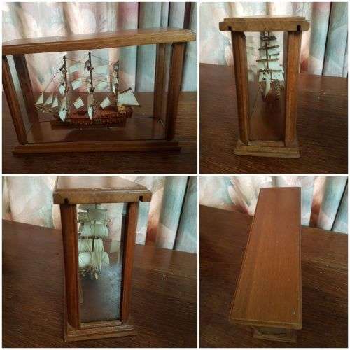 sailing ship in glass case