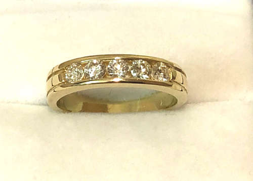 18 CT GOLD ETERNITY RING WITH .50 CT OF GENUINE DIAMONDS J SI1