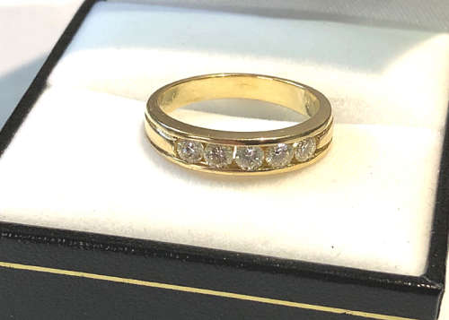 18 CT GOLD ETERNITY RING WITH .50 CT OF GENUINE DIAMONDS J SI1