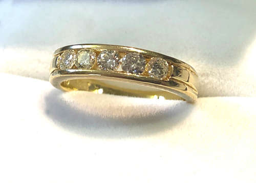 18 CT GOLD ETERNITY RING WITH .50 CT OF GENUINE DIAMONDS J SI1