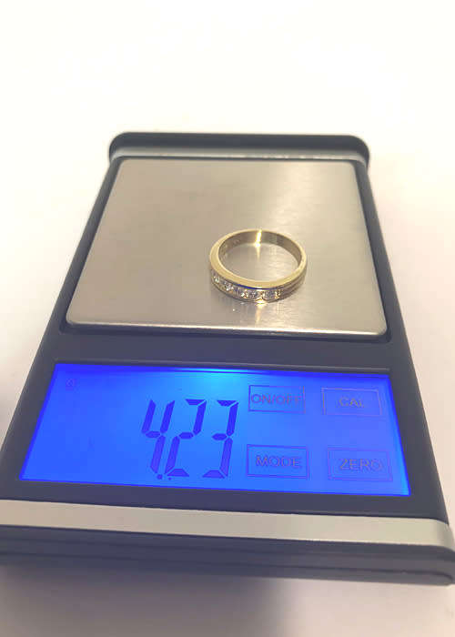 18 CT GOLD ETERNITY RING WITH .50 CT OF GENUINE DIAMONDS J SI1