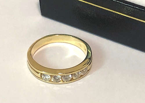 18 CT GOLD ETERNITY RING WITH .50 CT OF GENUINE DIAMONDS J SI1